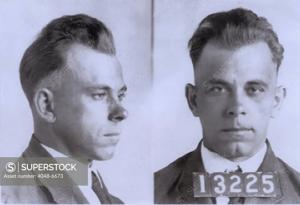 John Dillinger (1903-1934), in mugshot probably made during his eight and half year term in Indiana State Prison. Dillinger was played by actor Warren Oates in the 1973 movie DILLINGER, and by Johnny Depp in 2009 film, PUBLIC ENEMIES. Ca. 1925.