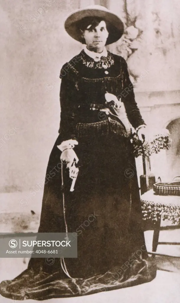 Belle Starr (1848-1889), photographed holding a revolver, was an active Western outlaw in Indian Territory (Oklahoma) the 1870s and 1880s. Gene Tierney starred in the 1941 film, BELLE STARR.