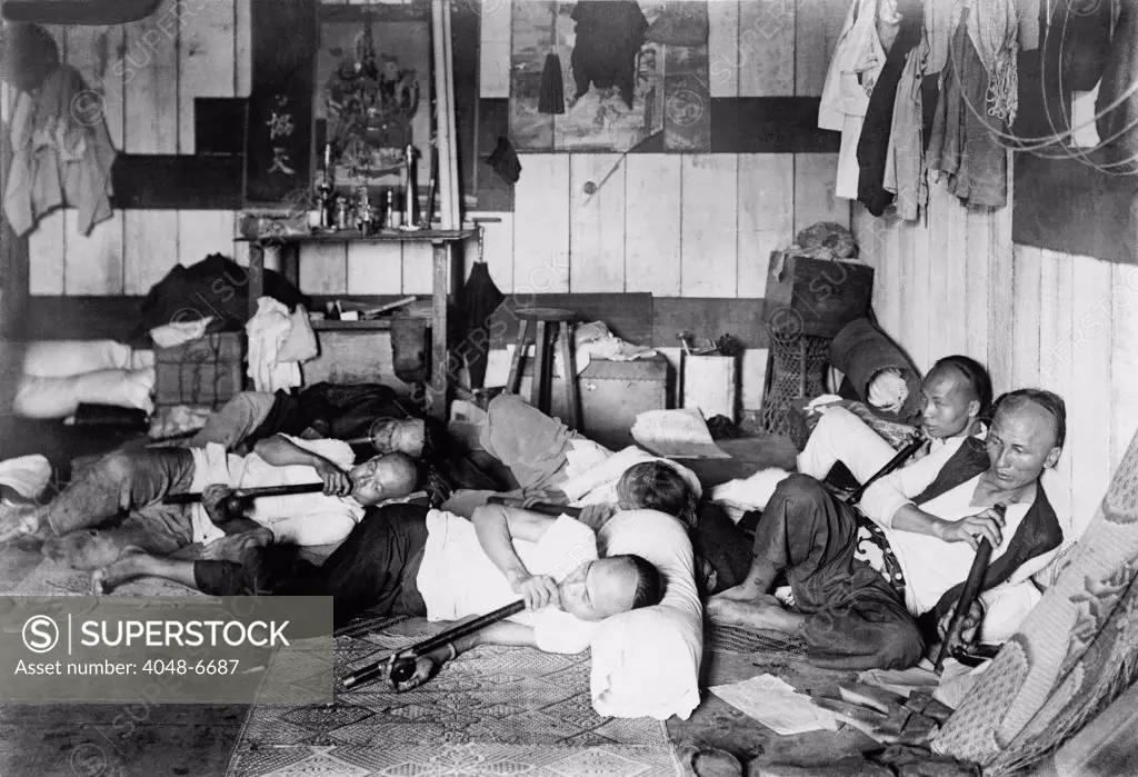 Ethnic Chinese smoking in an opium den in Manila, Philippine. 1924.