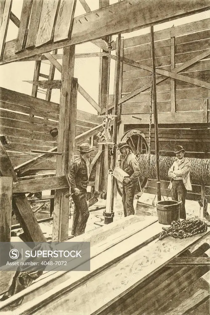 Filling the torpedo shell prior to shooting the oil well. Nitroglycerine torpedoes were lowered into completed wells and then exploded, creating a local earthquake that broke up the rock allowing the oil to flow more freely, often causing gushers. Ca. 1880.