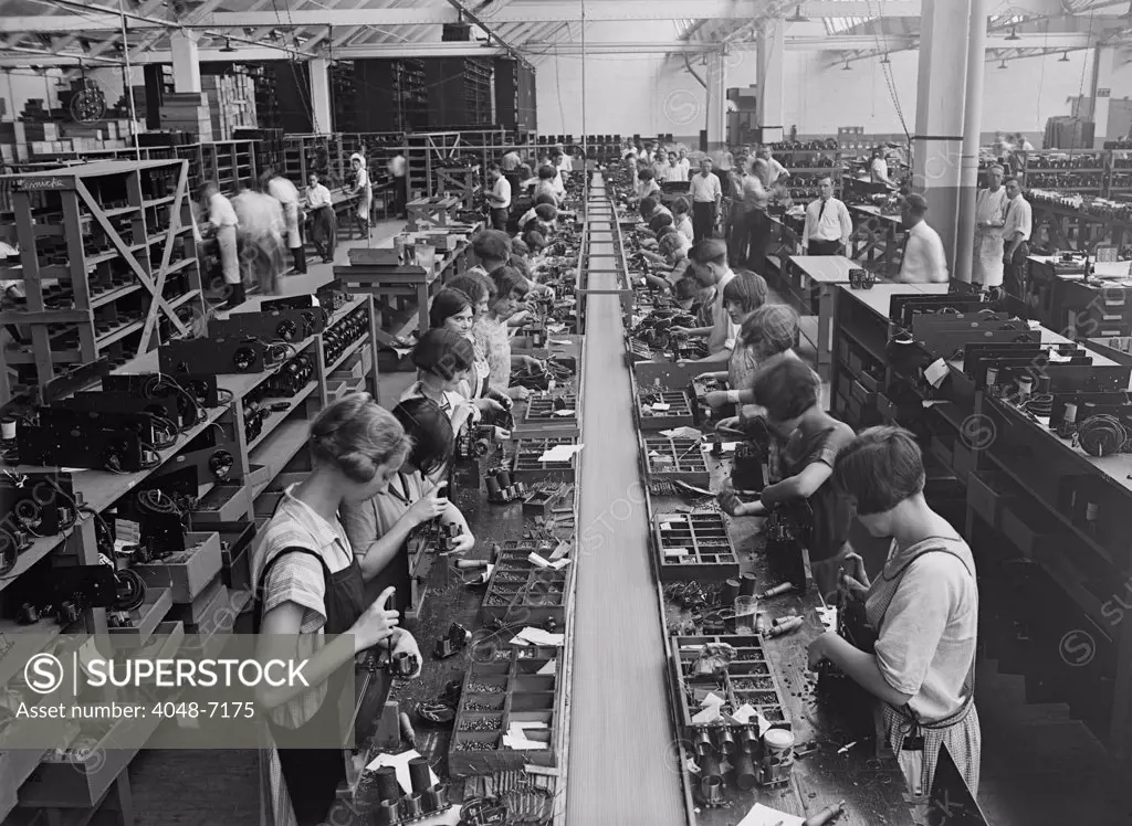 Men and women working on a radio assembly line in Washington D.C. area. 1925.