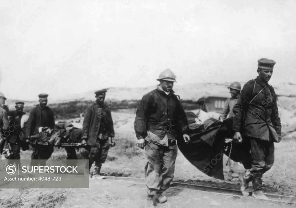 World War I, wounded American soldiers of the 132nd Infantry being carried by German prisoners of war at Dead Man's Hill, U.S. Signal Corps photograph, 1918