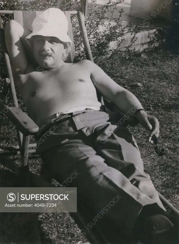 Albert Einstein (1879-1955), sunbathing in 1932, the year before renounced his German citizenship for political reasons and emigrated to America to take the position of Professor of Theoretical Physics at Princeton.