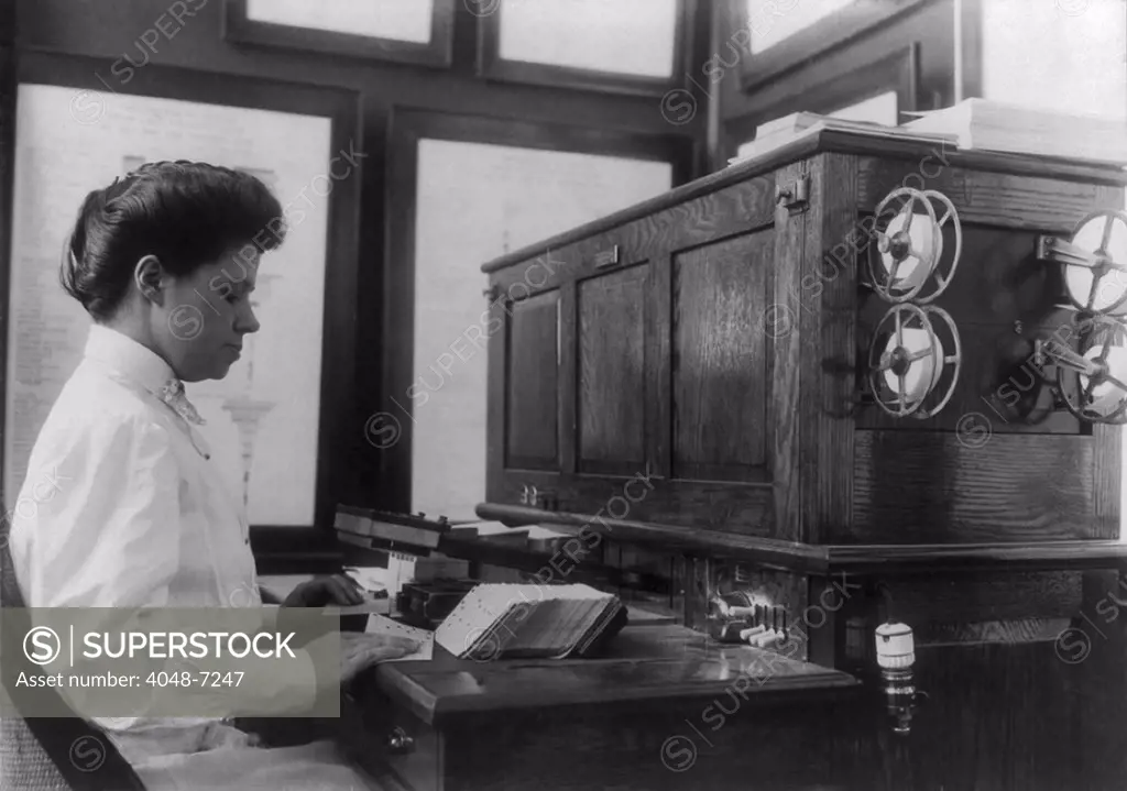 Women working with punch cards at an early tabulating machine at the U.S. Census Bureau, ca. 1908.