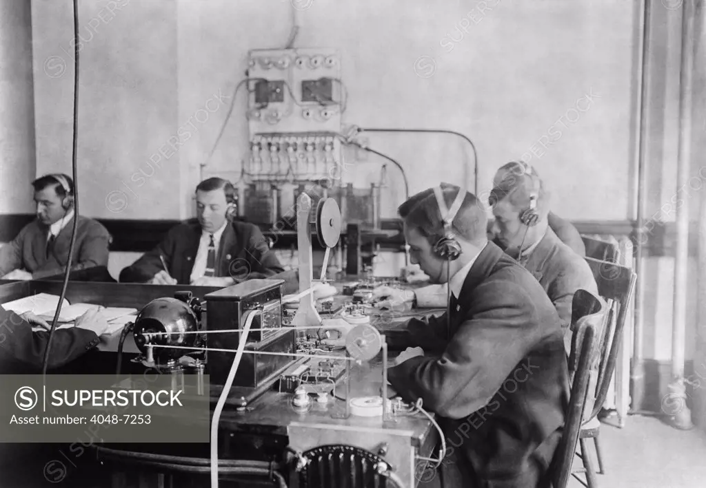 Students practicing telegraphy at the Marconi wireless school in New York City. Ca. 1912.