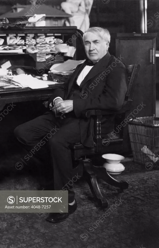 Thomas A. Edison (1847-1931) at his desk in his West Orange, New Jersey, laboratory, ca. 1913.