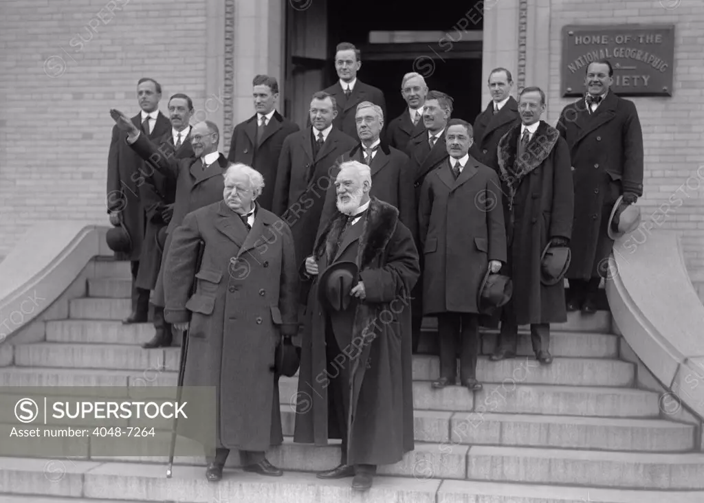 Famous inventor, Alexander Graham Bell, on the steps of the National Geographic Society to celebrate the anniversary of the Bell Telephone, 1916. Bell in in front right, next to Theodore Vail. Directly behind Bell is Thomas A. Watson.