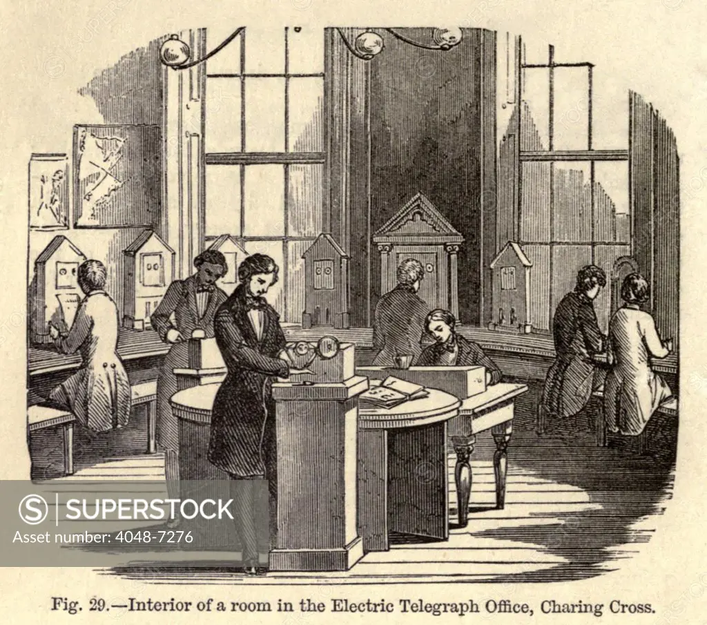 Interior room of the Electric Telegraph Office at Charing Cross, London. British telegraph equipment was based on the Cooke-Wheatstone patent, the clock-like devices along the walls, in which the receiver pointed to the letters on a dial, which spared operators the task of translating code.