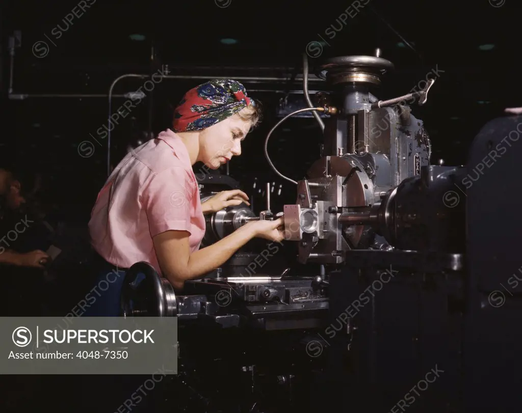 Women defense worker in training at Douglas Aircraft Company plant, Long Beach, California. October 1942.