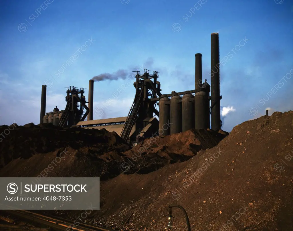 Blast furnaces and iron ore at the Carnegie-Illinois Steel Corporation mills, Etna, Pennsylvania. November 1941.