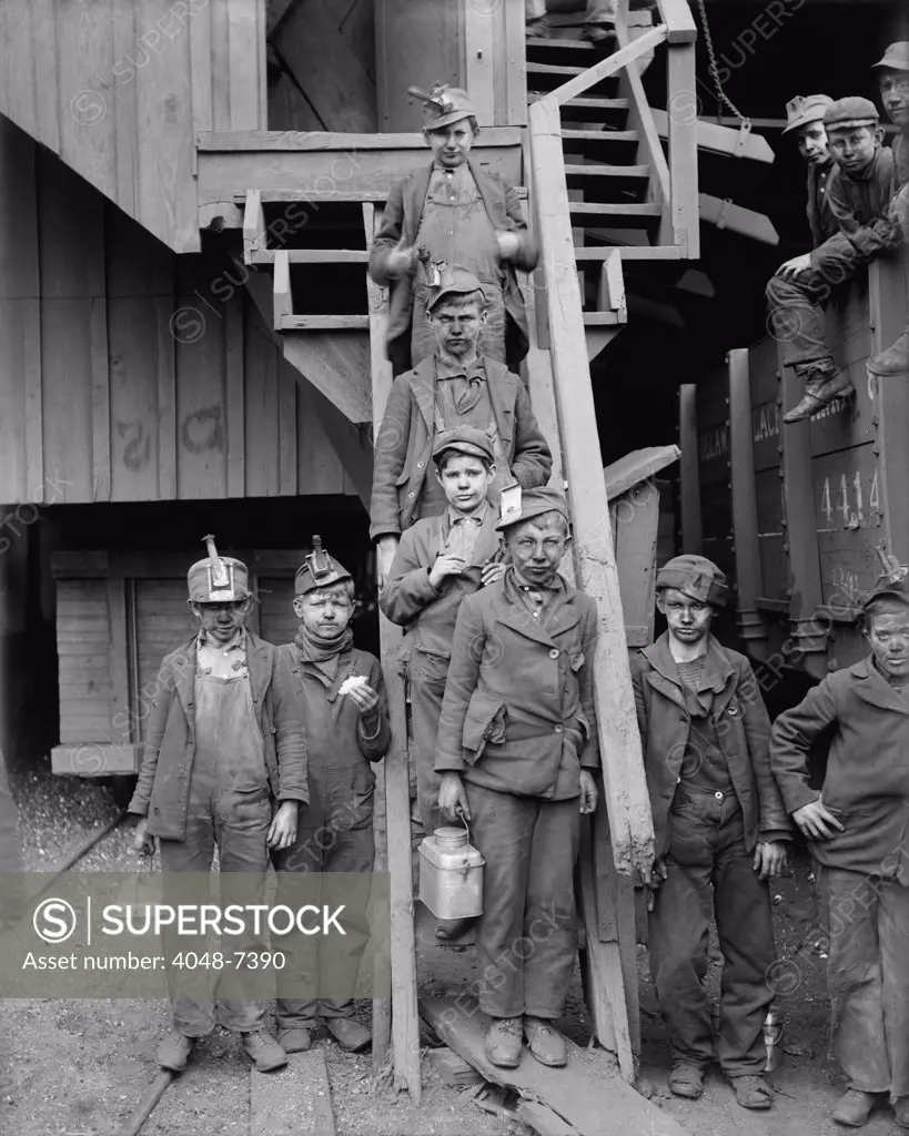 Dust covered Breaker Boys at the Woodward Coal Mines, Kingston, Pennsylvania. The youngest coal mine workers started at this dirty, unskilled work. C. 1900.