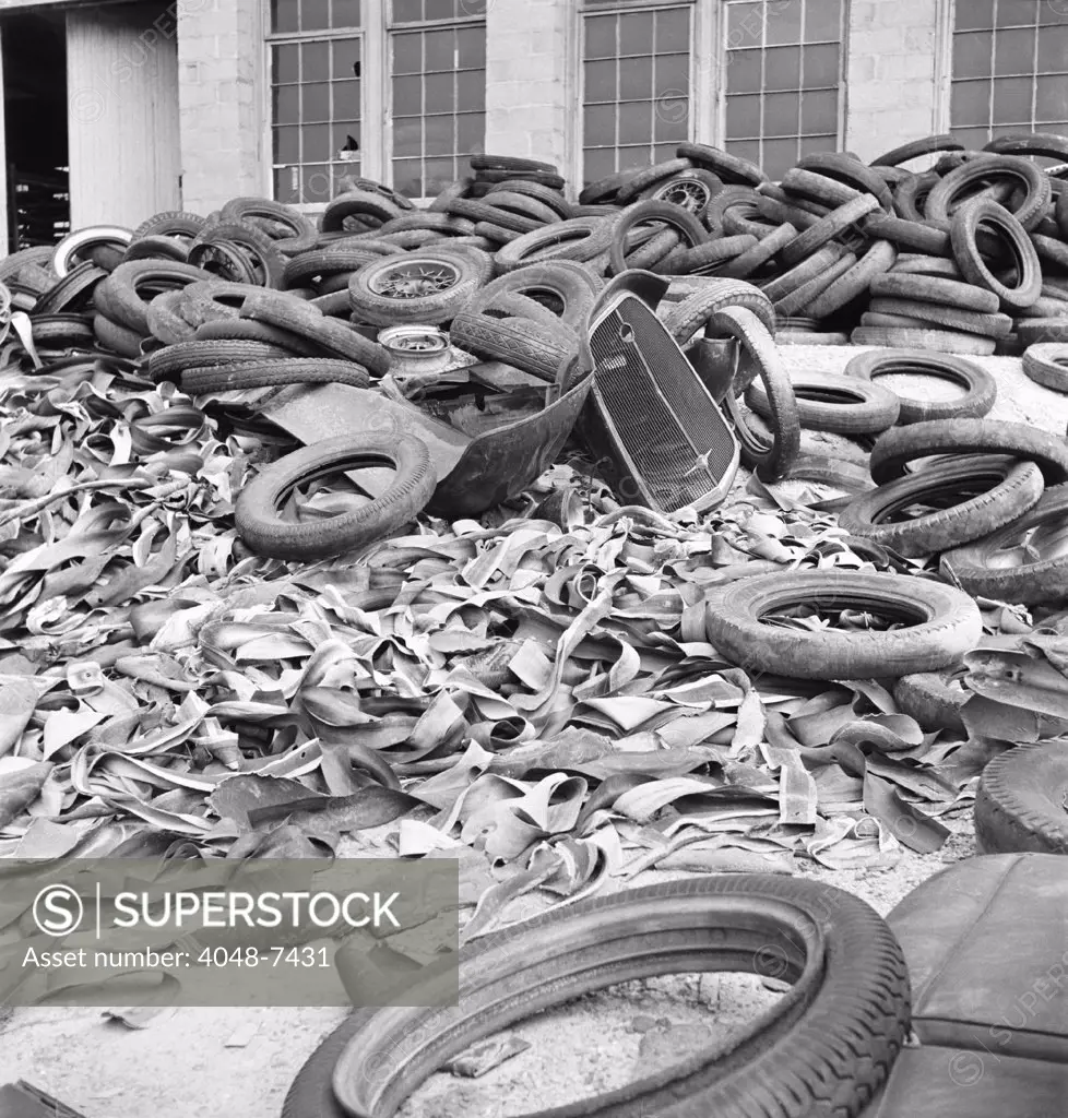 Rubber tires gathered to be recycled in August, 1941. World War II reduced rubber imports and increased demand, causing rubber to be rationed throughout the war.