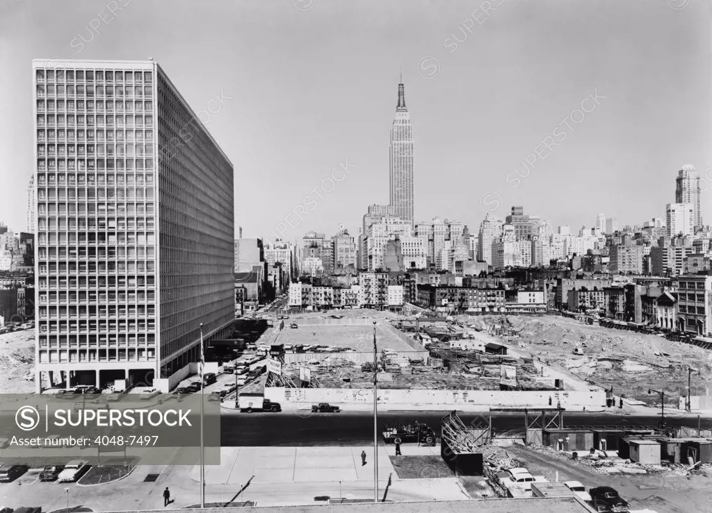 Kip's Bay Suite construction project, showing finished modern apartment building by Architect I.M. Pei and foundations for additional buildings, New York City in 1961.