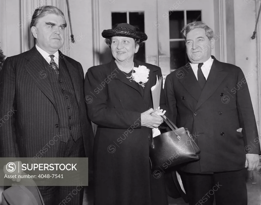 John L. Lewis, President of the C.I.O., Francis Perkins, Secretary of Labor, and James Dewey, Labor Department conciliator after a conference with President Roosevelt to discuss a coal industry labor dispute. May 9, 1939.