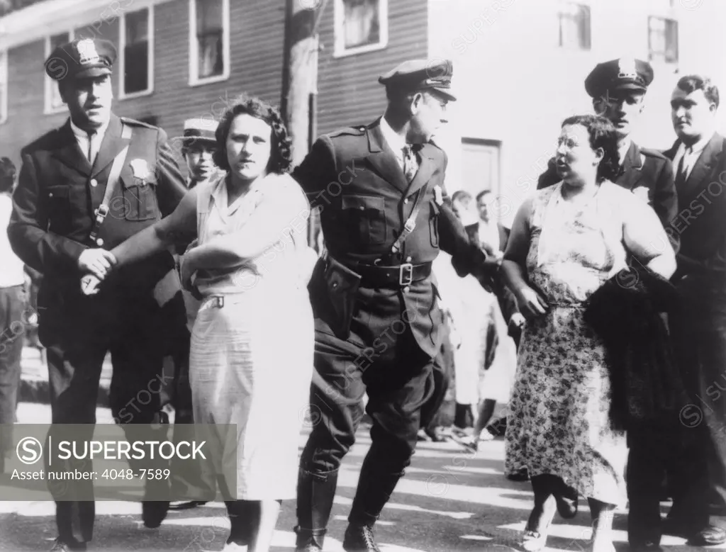 Women textile workers arrested by policemen for picketing the Jackson mill in Nashua, New Hampshire. Sept. 7, 1934.