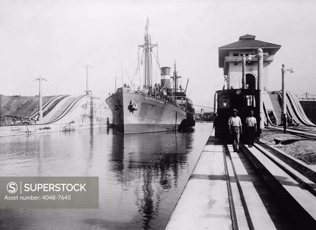 Ship moves through the Miraflores Lock of Panama Canal, ca. 1915.