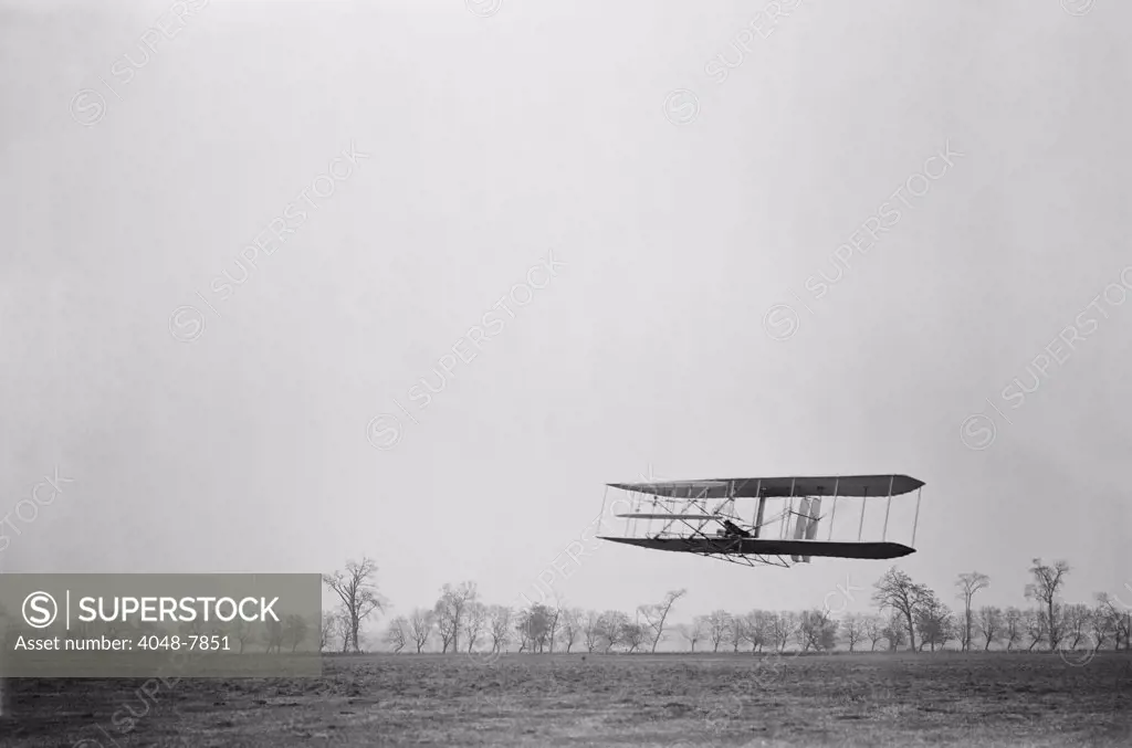 Orville Wright 1871-1948 in flight over treetops covering a distance of approximately 1 760 feet in 40 1/5 seconds at Huffman Prairie Dayton Ohio. November 16 1904. LC-DIG-ppprs-00616