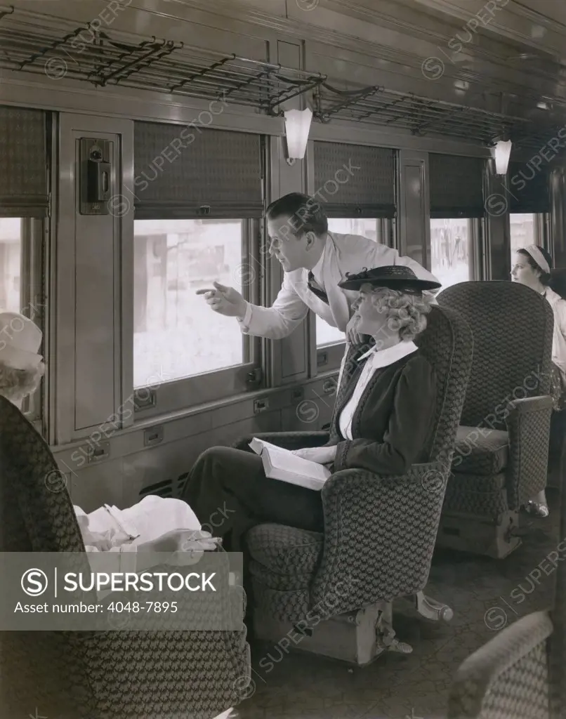 First class passengers in an air-conditioned 'Imperial Salon' of the Chesapeake and Ohio Railroad. 1930s.