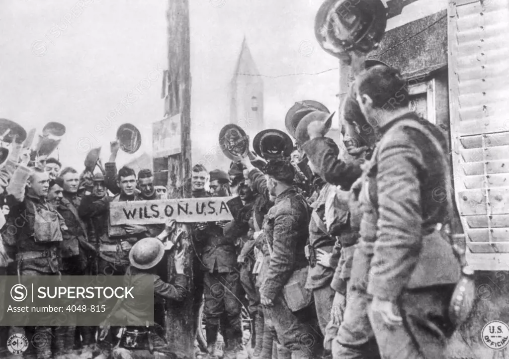 World War I, victorious American soldiers renaming Hindenburgstrasse to Wilson U.S.A. in Vigneulles, France, 1918, U.S. Signal Corps photograph