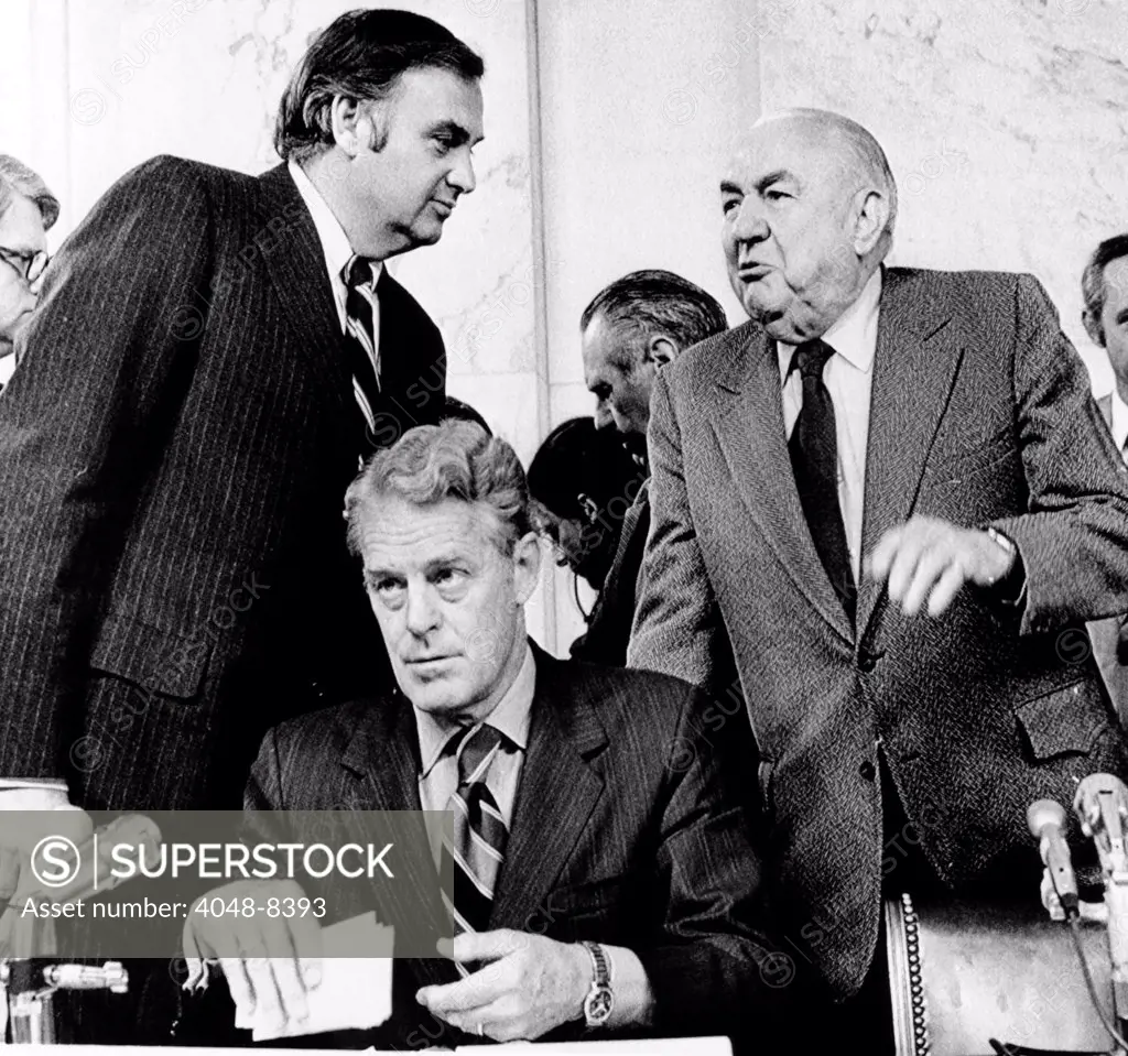 Senate Watergate Committee. Members of the committee about to start proceedings. L-R: Lowell Weicker, Edward Gurney, and Sam Ervin. May 18, 1973.