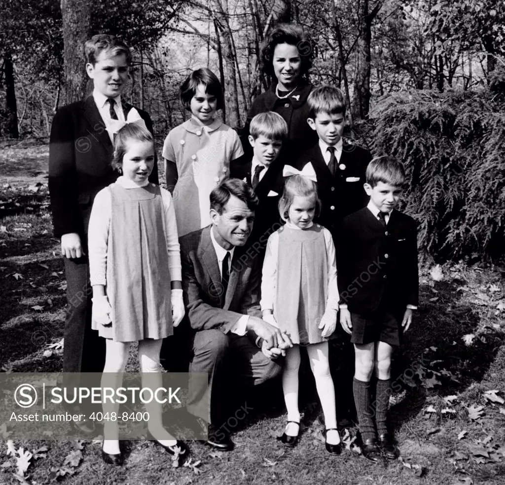 Senator-elect Robert Kennedy and wife Ethel with seven of their eight children. They were at the Bronx Zoo in New York City. Front, L-R: Mary, 85, the Senator-elect, Kerry, 5, and Michael, 6. Behind are L-R: Joseph,12, Kathleen, 13, David, 9, Ethel, Robert, Jr. 11. Ethel is expecting their ninth child. Nov. 6, 1964.