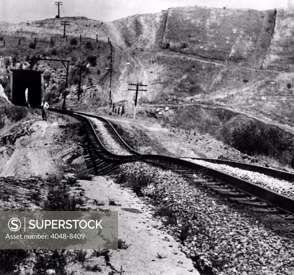 Railroad tracks damaged by an earthquake. Tehachapi, California was hit by a magnitude 7.3 Richter scale earthquake on White Wolf Fault in Kern County. 9 people were killed. July 21, 1952.