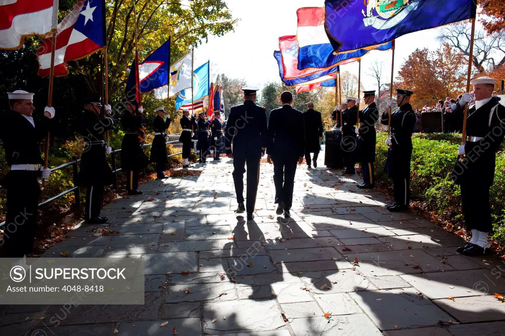 President Barack Obama walks with Gen. Michael Linnington to the Tomb of the Unknowns at Arlington National Cemetery in Arlington, Va., to mark Veterans Day, Nov. 11, 2011.