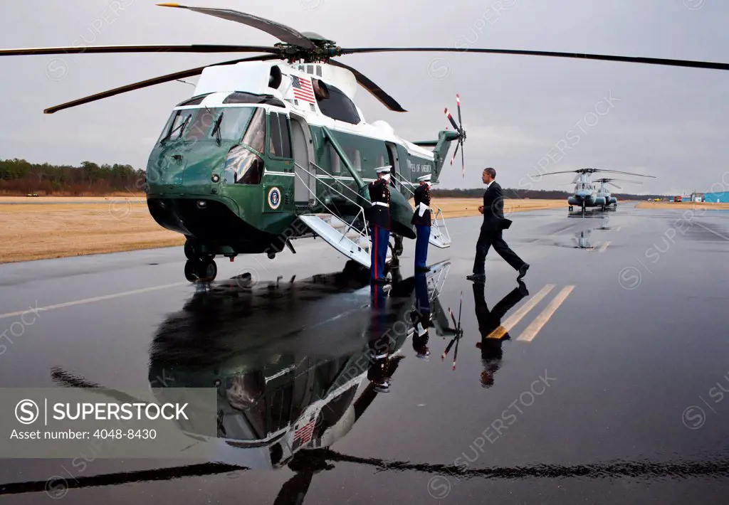 President Barack Obama boards Marine One for departure from Cambridge-Dorchester Airport in Cambridge, Md., Jan. 27, 2012.
