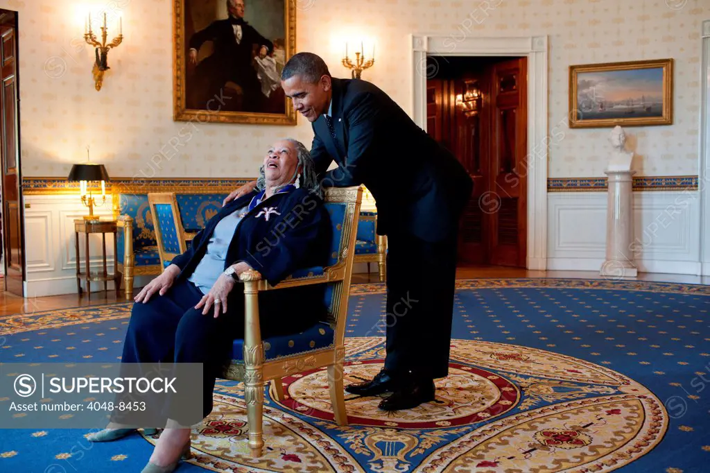 President Barack Obama talks with Presidential Medal of Freedom recipient Toni Morrison in the Blue Room of the White House, May 29, 2012.