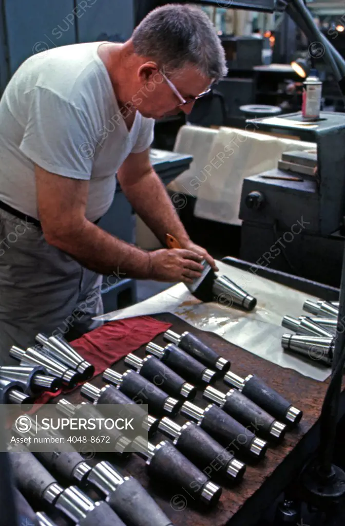Worker at Gary Steel Works Finishing Facility, US Steel Corporation, Gary, Indiana, 1966. Finished parts were used in automotive, metal parts components, home construction and appliance markets. Photo: John G. Zimmerman Archive/Everett Collection