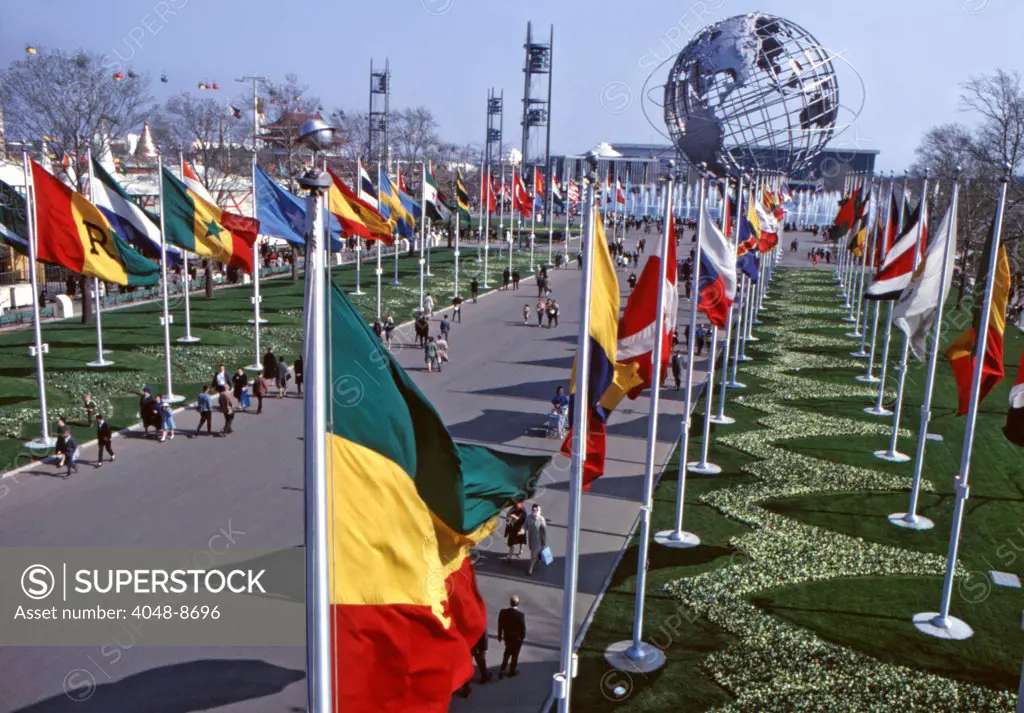 World's Fair, New York, 1964. View down the colorful Avenue of Flags towards the Unisphere. Photo: John G. Zimmerman Archive / Courtesy Everett Collection