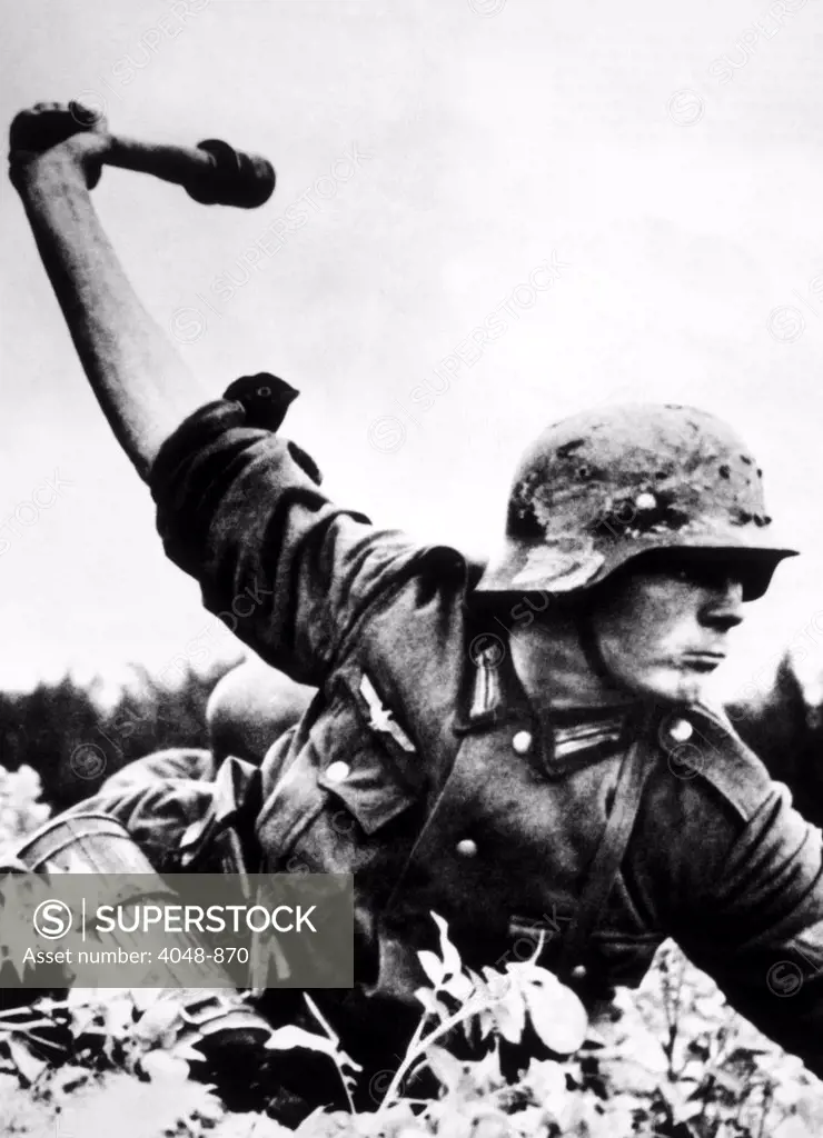 World War II, A German soldier about to threw a hand grenade in Poland, 1939