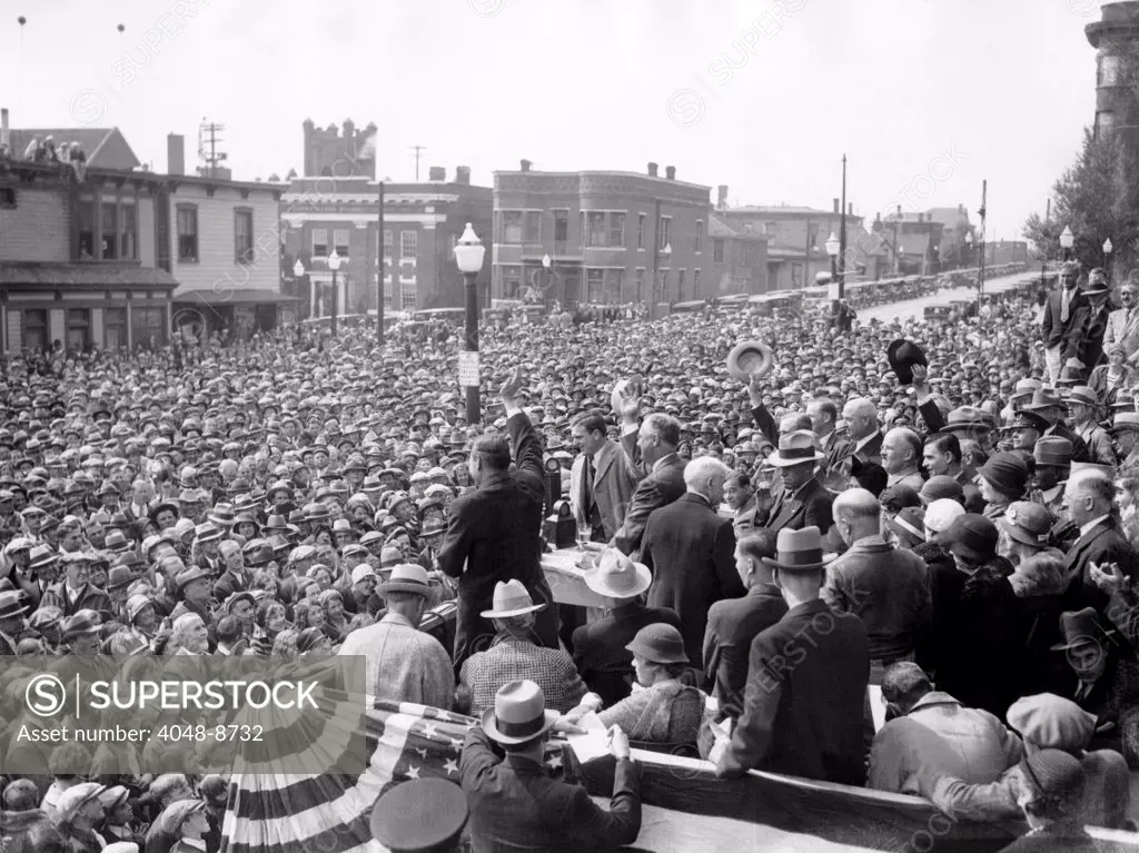 Democratic Presidential candidate, Franklin Roosevelt, speaks to a crowd of over 10,000 at Butte, Montana. FDR pledged Montana miners to review US monetary policy, and in 1934 he established a silver purchase program in which the U.S. Treasury would buy all newly mined silver. Sept 20, 1932.