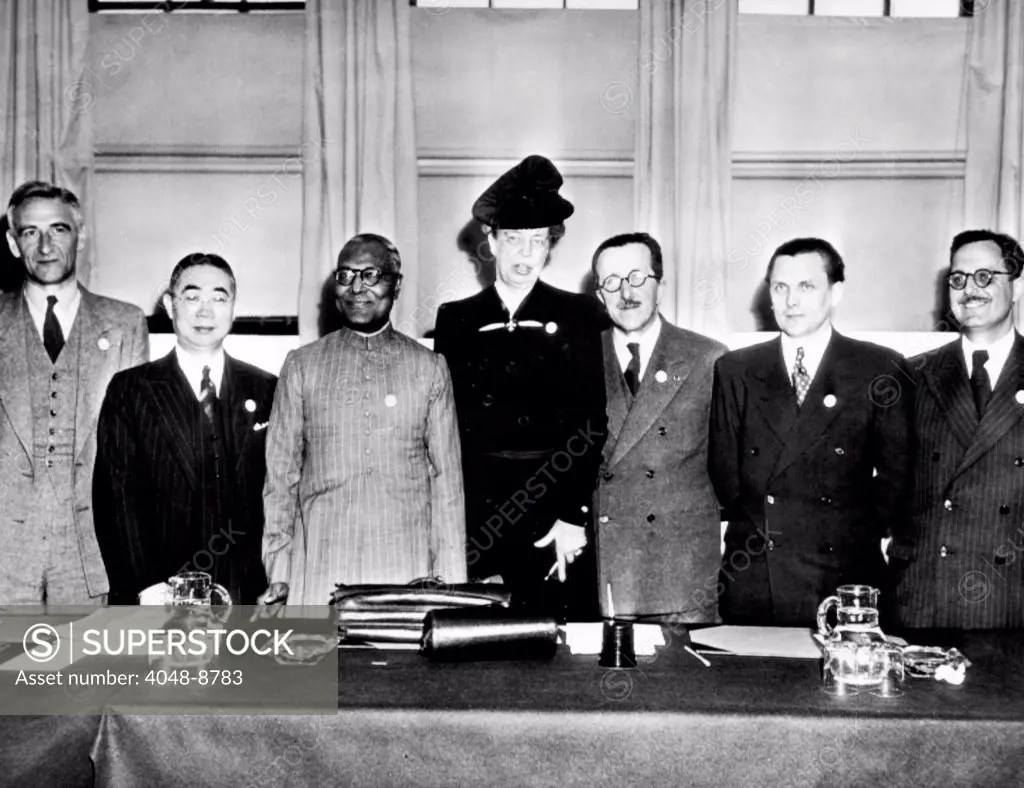 Eleanor Roosevelt chaired the United Nations, Commission on Human Rights. At an April 20, 1946 meeting, L-R: Dr. B.J. Schmidt, secy, Dr. C.L. Hsia, China, K.G. Noogi, India, Mrs. Roosevelt, Henri Laugier, France, Nicolai Kriukov, Russia, and Dusan Brkish, Yugo.