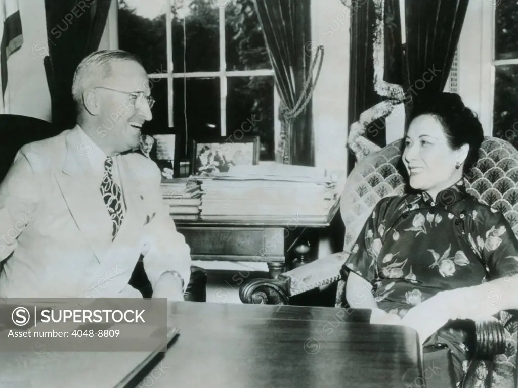 Madame Chiang Kai-Shek meeting with President Truman at the White House. The influential wife of the Chinese beleaguered leader was admired during China's struggles in WW II. August 29, 1945.