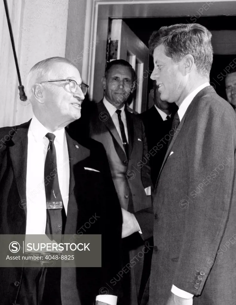 President Kennedy with White House visitor, former President Harry Truman. June 13, 1963.