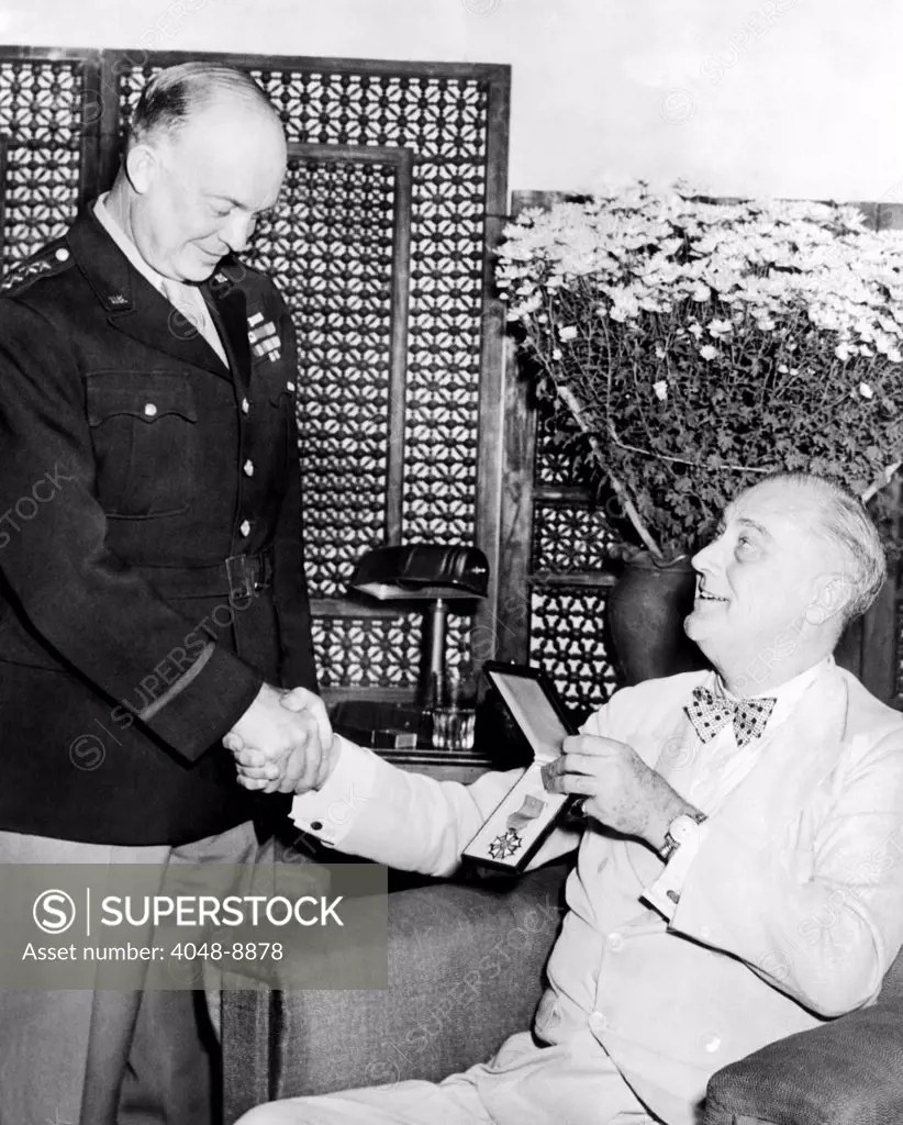 President Franklin Roosevelt presents Legion of Merit to General Eisenhower. President Roosevelt was awarded the medal during the Cairo Conference. Dec. 3, 1943.