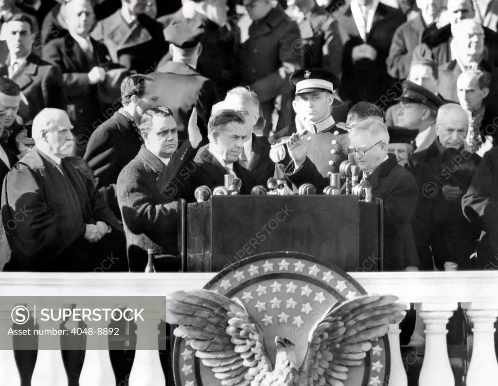 FDR's third term Vice President, Henry A. Wallace took the oath of office as administered by outgoing VP, John Nance Garner. L-R: Chief Justice, Charles Evans Hughes, Thomas Qualters, FDR's Bodyguard, VP Wallace, President Roosevelt, directly behind Wallace, Capt. James Roosevelt, John Nance Garner, and Cordell Hull. Jan 20, 1941.