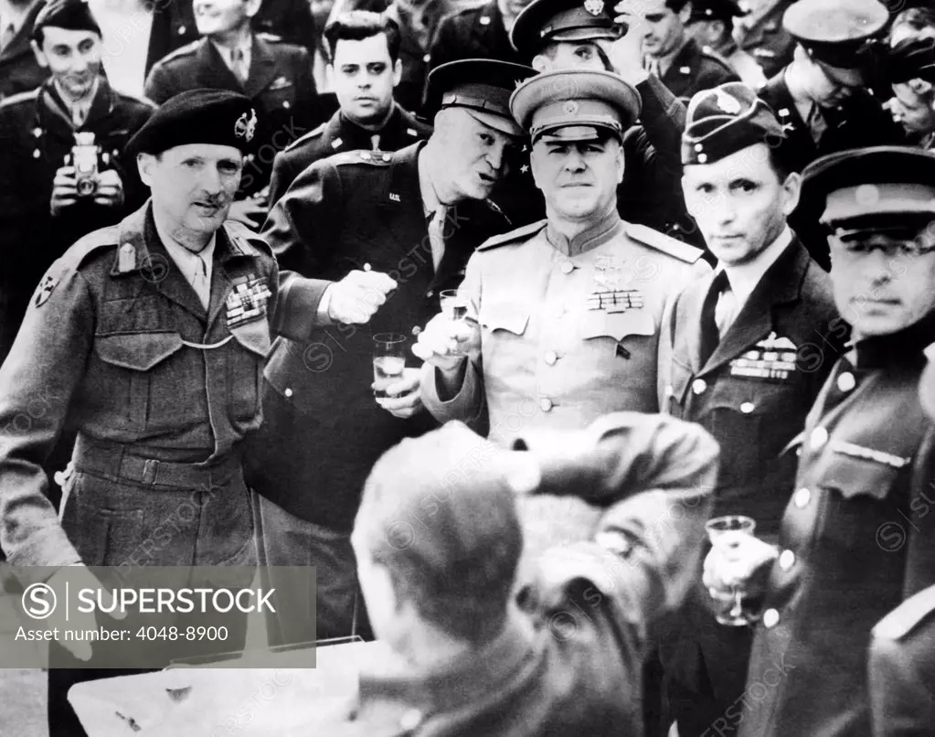 Allied leaders drink a victory toast at Frankfurt am Main, Germany. L-R: Field Marshall Sir Bernard Montgomery, Gen. Dwight Eisenhower, Marshal Gregor Zhukov, Air Chief Marshall Sir Arthur Tedderog. June 10, 1945.