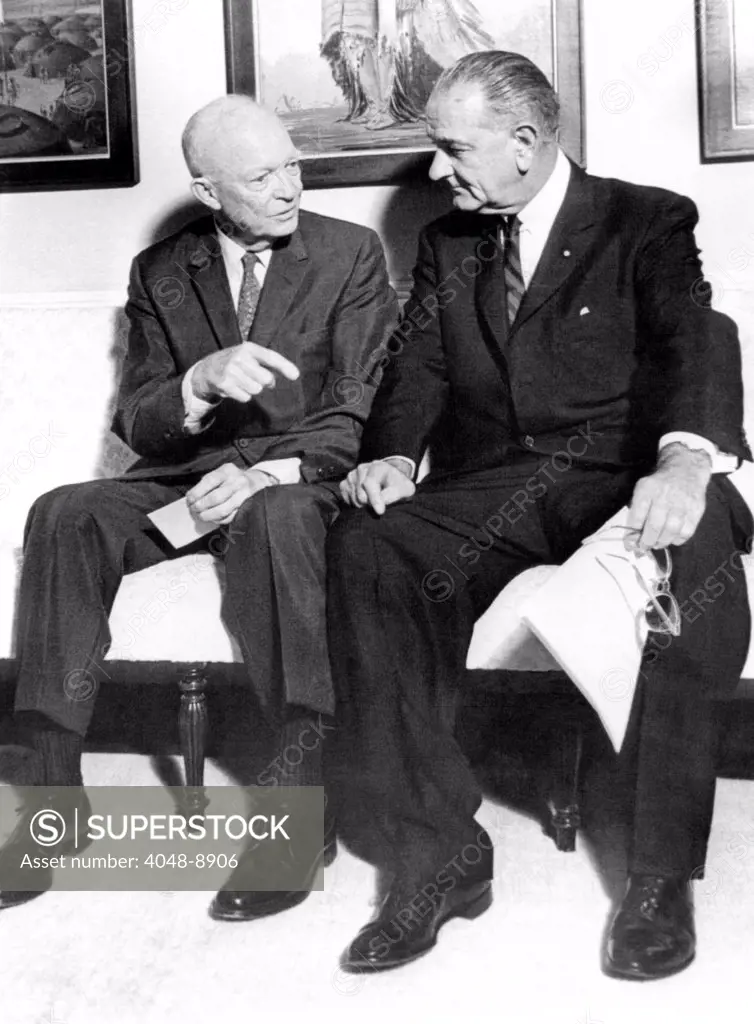 Former President Dwight Eisenhower with President Lyndon Johnson at the White House. The visit publicized Johnson's $100 contribution to the construction funds of Eisenhower College, in Seneca Falls, N.Y. Aug. 8, 1925.