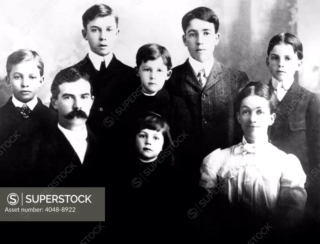 Eisenhower family in 1902. L-R Front row: Father David Eisenhower, Milton, Mother Ida. Back row: Dwight, Edgar, Earl, Arthur, Roy.