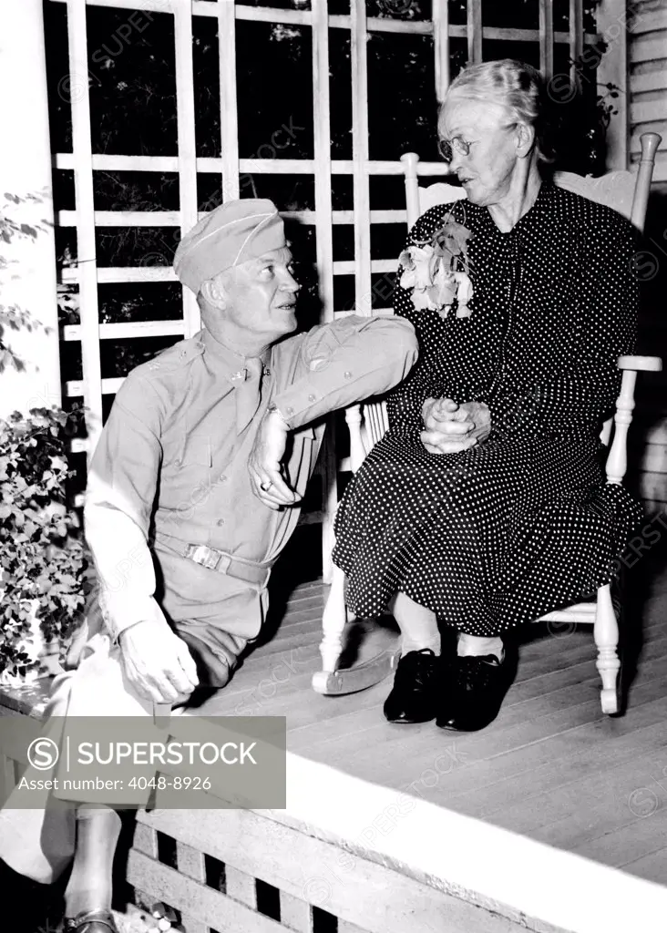Dwight Eisenhower at his mother's knee. The Supreme Commander of the Allied Expeditionary Forces, came back to Abilene, Kansas for a visit following Germany's surrender in May 1945. June 24, 1945.