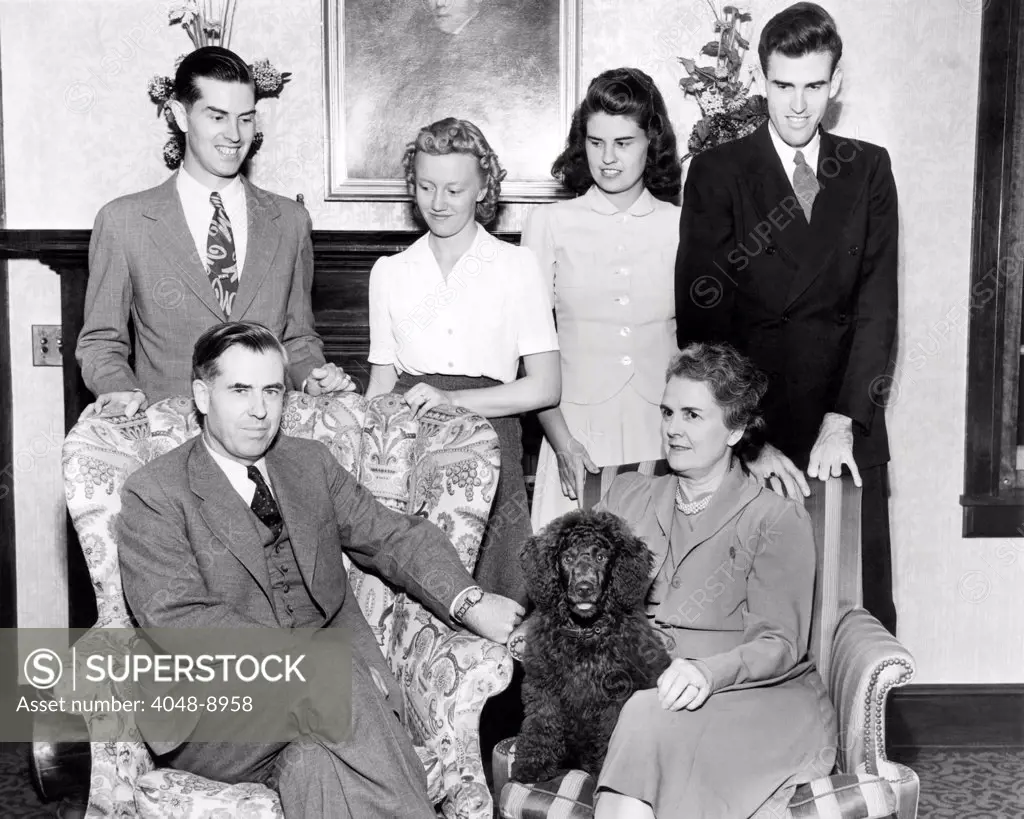 Vice Presidential nominee Henry Wallace with his family in Des Moines, Iowa. L-R: Seated Henry Wallace and Mrs. Florence Wallace. Standing are their children: Henry, 25, Florence, Jean, 20, and Robert, 22. Aug. 31. 1940.
