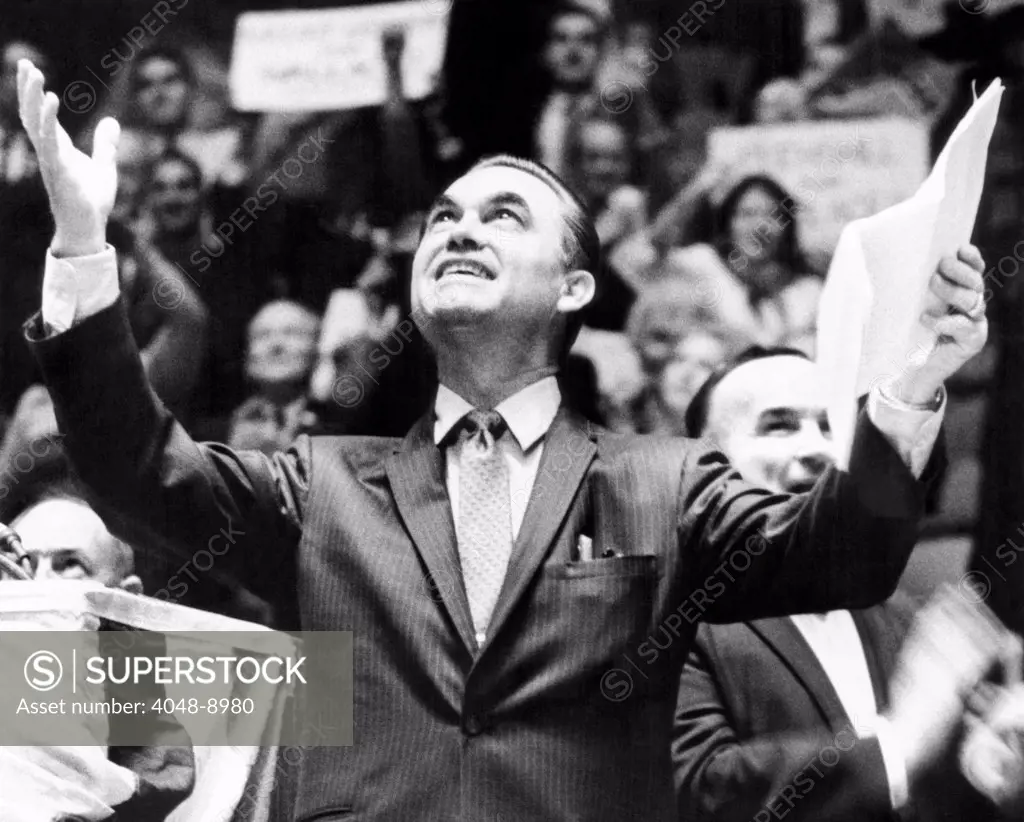 George Wallace acknowledges the cheers of supporters at Madison Square Garden. His 1968 right wing campaign found some supporters in traditionally Democratic and liberal New York City area. Oct. 24, 1968.