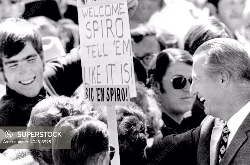 Vice President Spiro Agnew was greeted by 300 persons in Albuquerque. The sign reading, 'sic 'em Spiro' refers to his verbal attacks on anti-war groups and liberal politics. During his visit he told a press conference that 'Congress is injected with radical liberals'. Sept. 15, 1970.