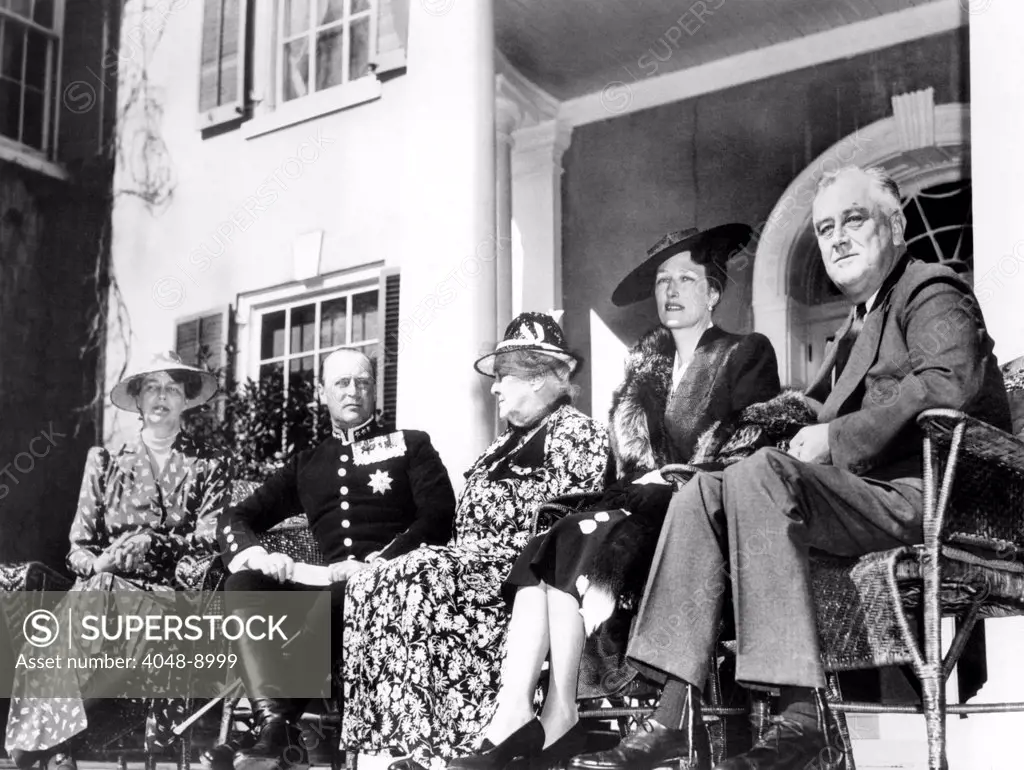 Franklin D. Roosevelt entertained Crown Prince Olav and Crown Princess Martha, of Norway, at the Summer White House. L-R: Eleanor Roosevelt, Prince Olav, Sara Delano Roosevelt, the President's mother, Princess Martha, and FDR. Hyde Park, New York. April 30, 1939.