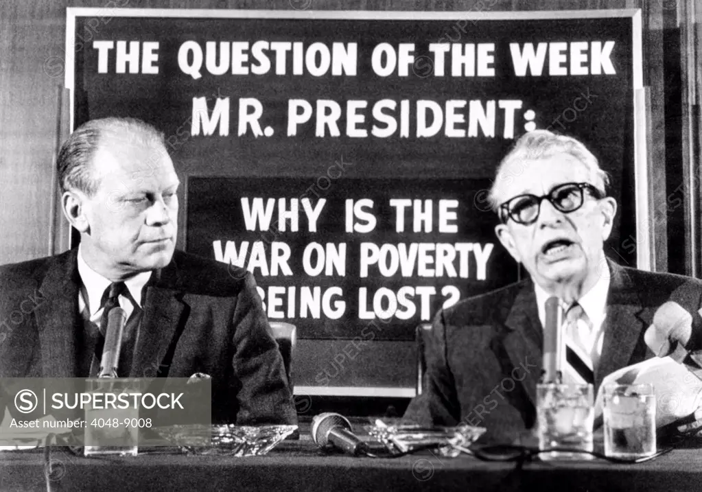 GOP Congressional leaders charged that Pres. Johnson's anti-poverty program shows the 'arrogance of power'. Rep. Gerald Ford (left) and Sen. Everett Dirksen, speak in front of a sign designed for Television. June 2, 1966.