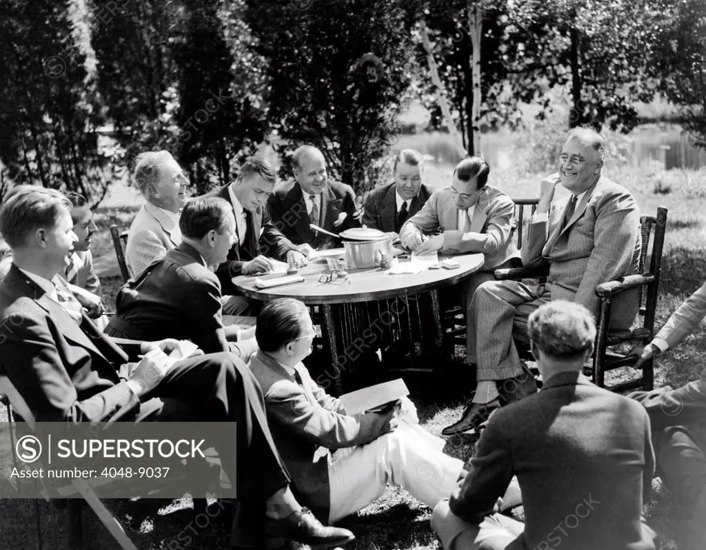 President Franklin Roosevelt at a picnic he gave for members of the press who accompanied him from Washington DC to his Hudson Valley home, in Hyde Park, New York. Sept 11, 1935.