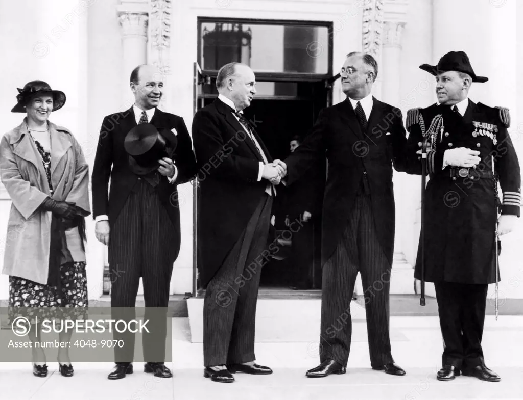 Canadian Premier Richard Bennett welcomed by FDR at the White House. L-R: Mrs. William Duncan Herridge, sister of Bennett and her husband, the Minister to Washington, the Premier, and President Franklin Roosevelt with his naval aid, Captain Walter Vernou. April 24, 1933.