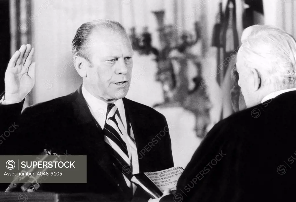 Gerald Ford takes the Oath of Office as the 38th president of the United States. Chief Justice of the US Supreme Court Warren Burger swears in the VP, shortly after Richard Nixon's resignation became official. August 9, 1974.